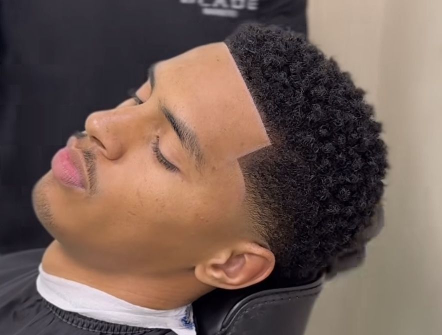 coupe homme afro tendance